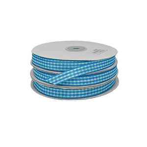 Cinta decorativa escocesa turquesa y blanco en rollo, ideal para productores y distribuidores creativos.