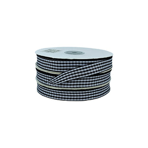 Cinta decorativa escocesa negro y blanco en rollo, ideal para productores y distribuidores creativos.