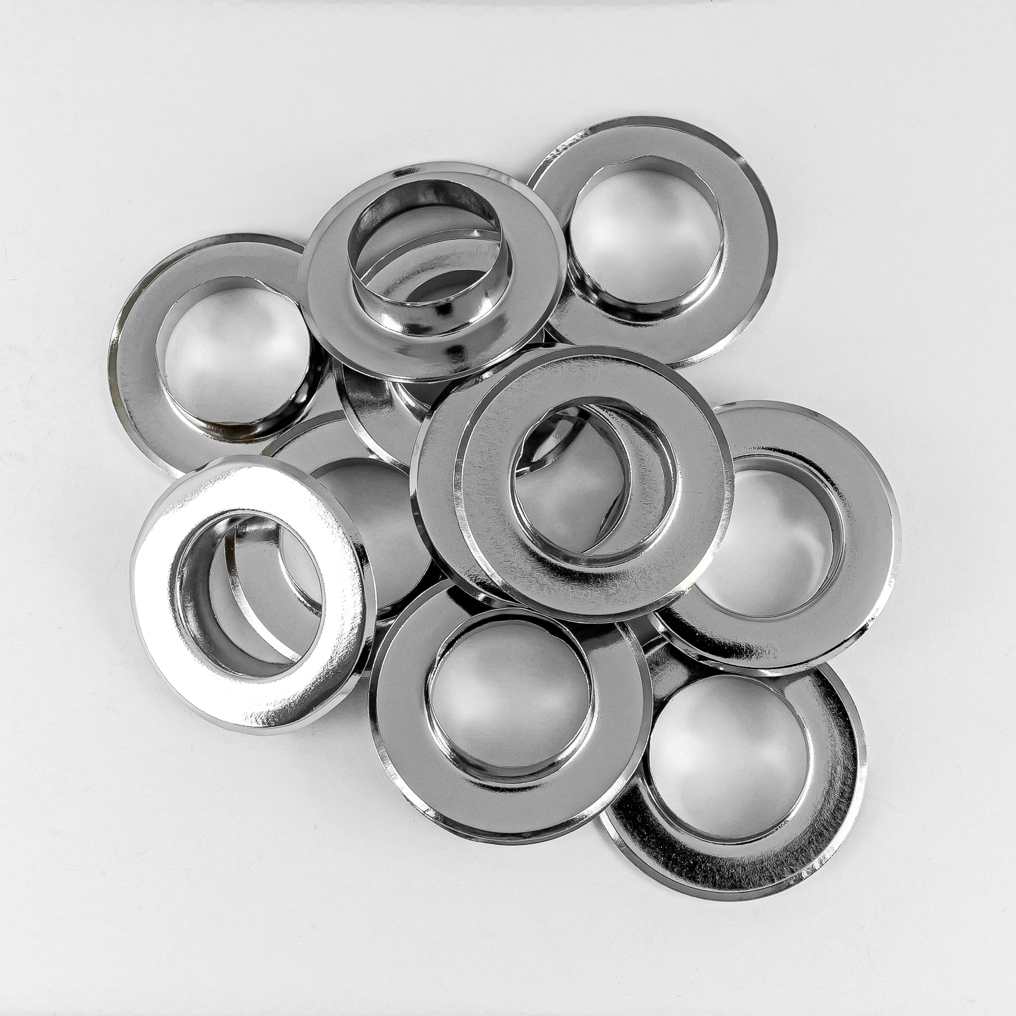 OJALETE PLANO LATON BASE ACERO 626 (26.5 MM) X 500 UNDS.