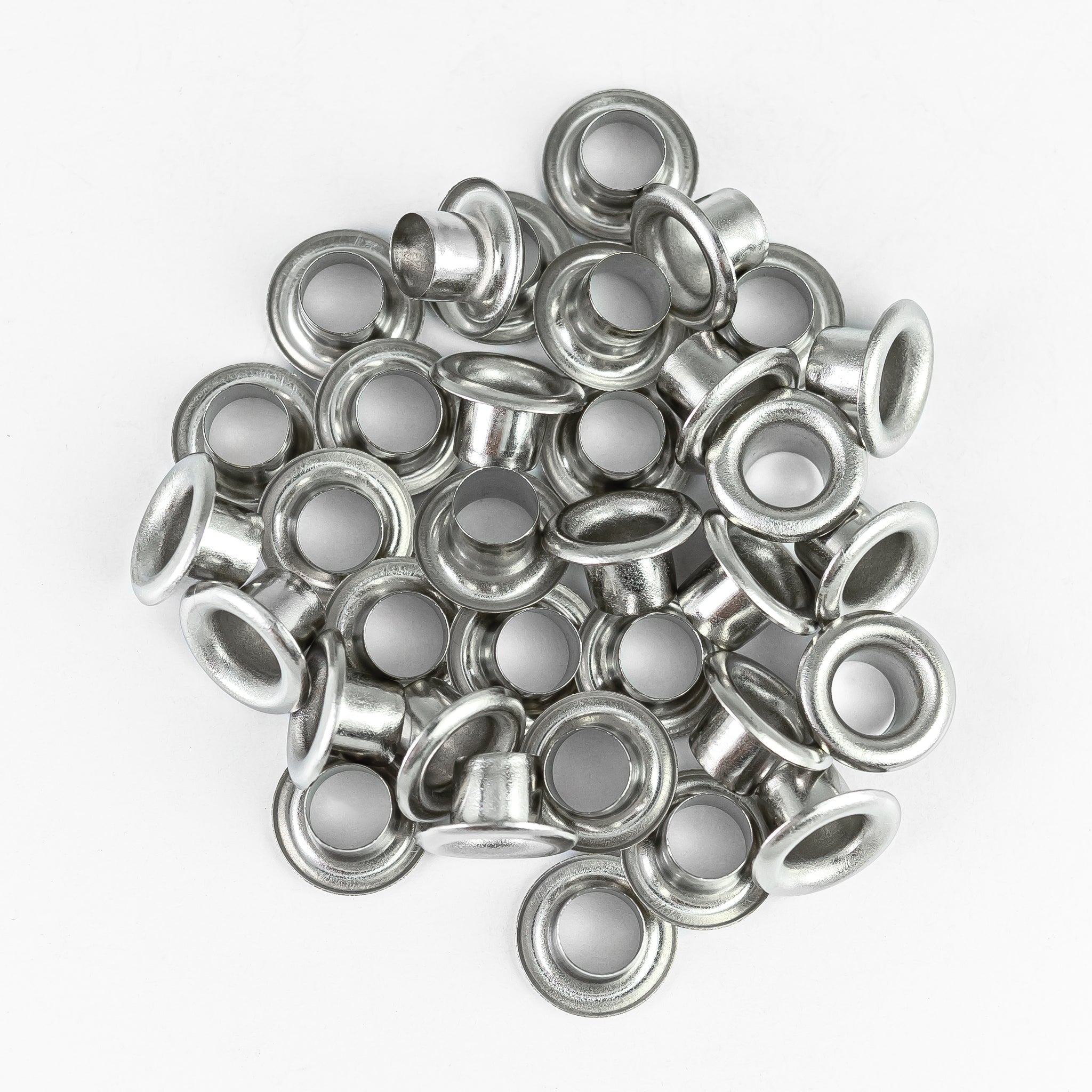 OJALETE LATON BASE ACERO 300(1/8) X 5000 UNDS.